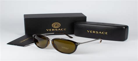 How to spot fake Versace glasses and sunglasses .